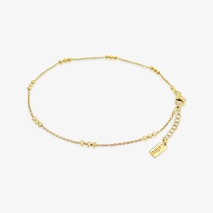 Bracelet de cheville avec des boules