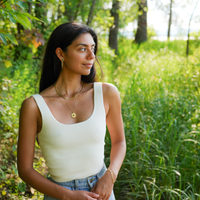 Fancy Curb earring with CZ-Emerald
