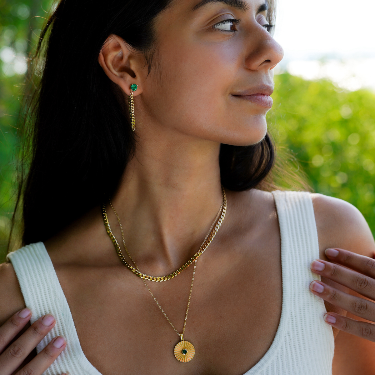 Fancy Curb earring with CZ-Emerald