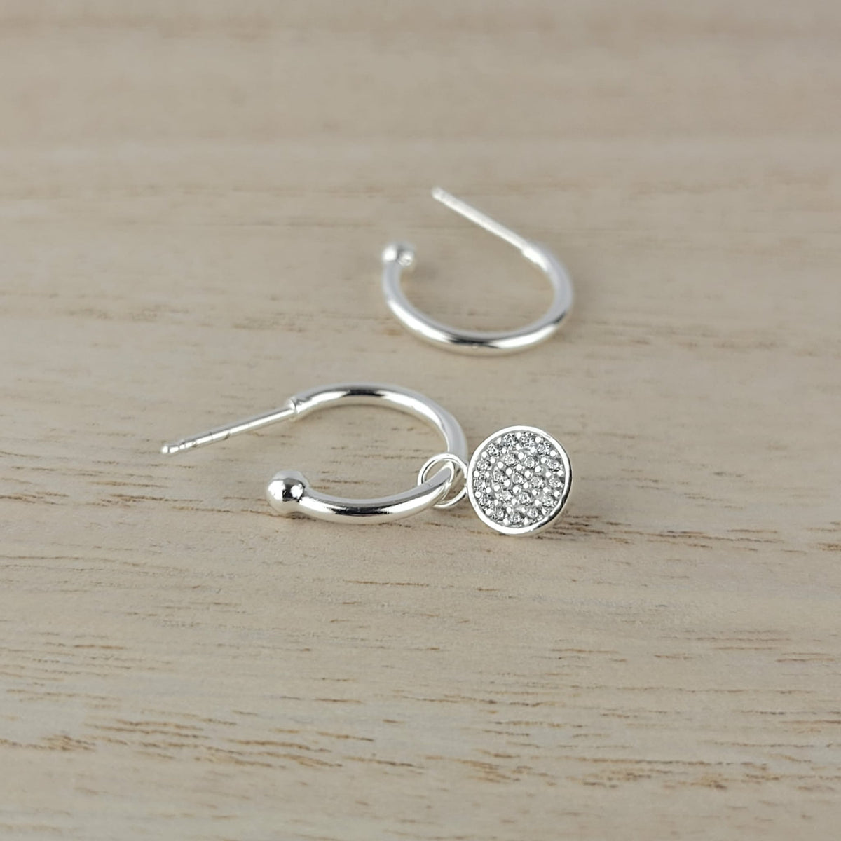 Boucle d'oreille unique breloque ronde CZ